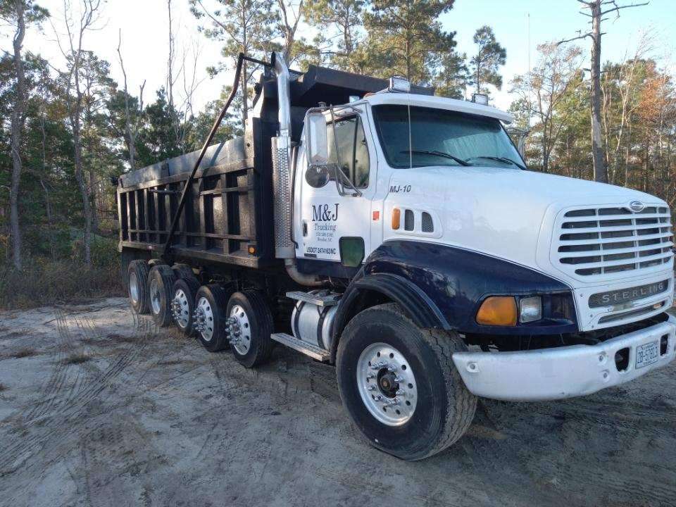 Bruta Murrell - Quint Axle Dump Truck - Beaufort North Carolina - Hauling service
